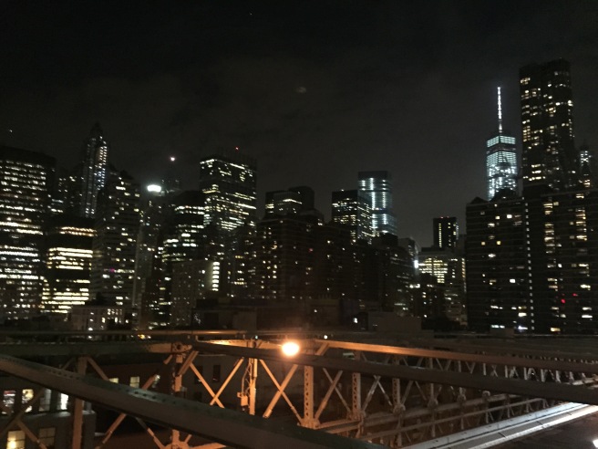 Views of Lower Manhattan and the Freedom Tower from the Brooklyn Bridge.